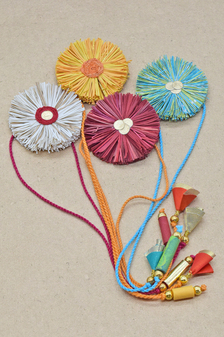 Paper Shred Unicolour Rakhi with Paper Tassels