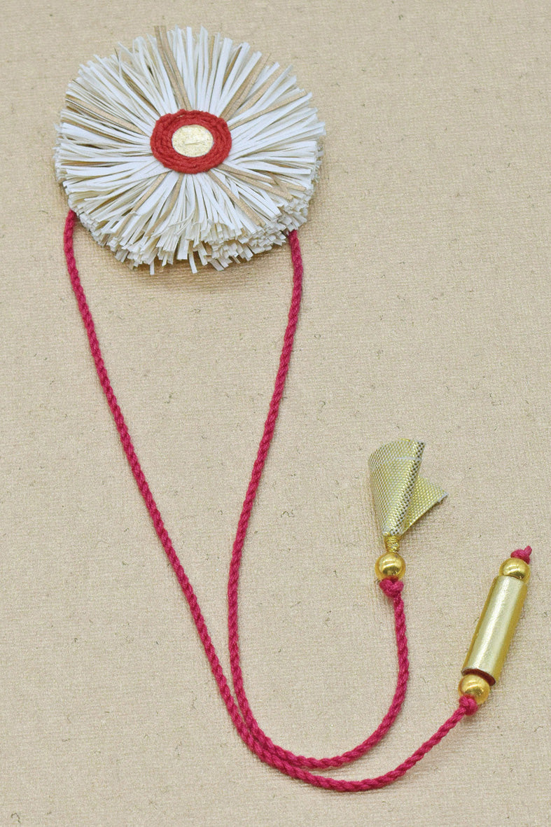 Paper Shred Unicolour Rakhi with Paper Tassels