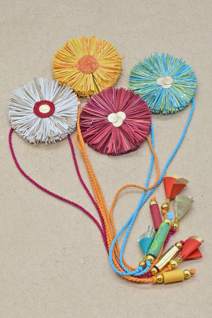 Paper Shred Unicolour Rakhi with Paper Tassels