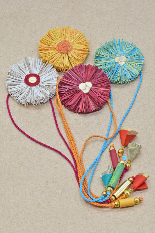 Paper Shred Unicolour Rakhi with Paper Tassels