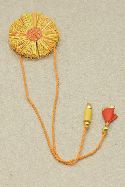 Paper Shred Unicolour Rakhi with Paper Tassels