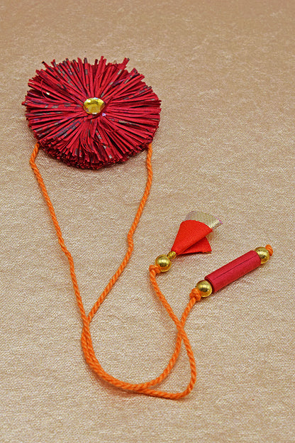 Paper Shred Unicolour Rakhi with Paper Tassels