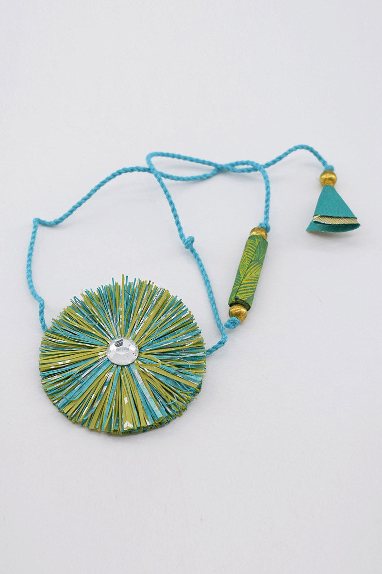 Paper Shred Unicolour Rakhi with Paper Tassels