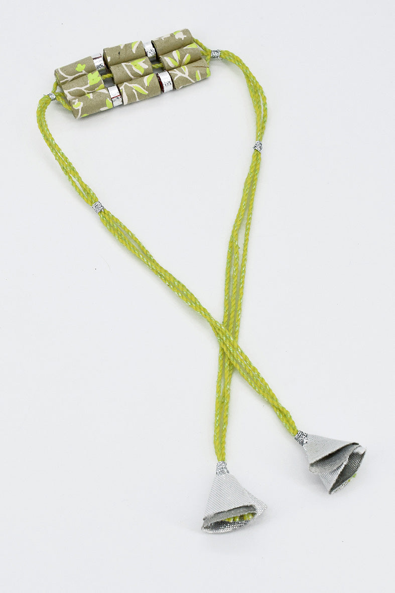 Trimmed paper bead rakhi with tassel