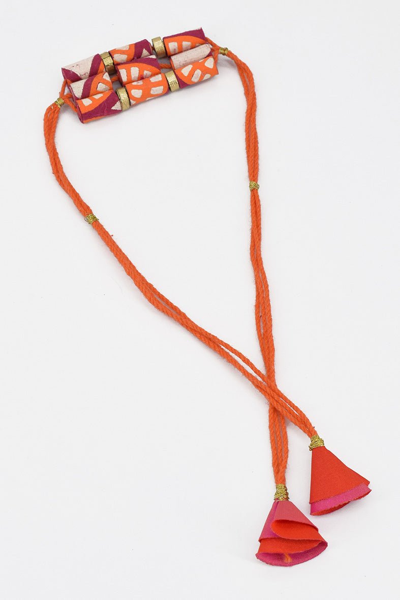 Trimmed paper bead rakhi with tassel