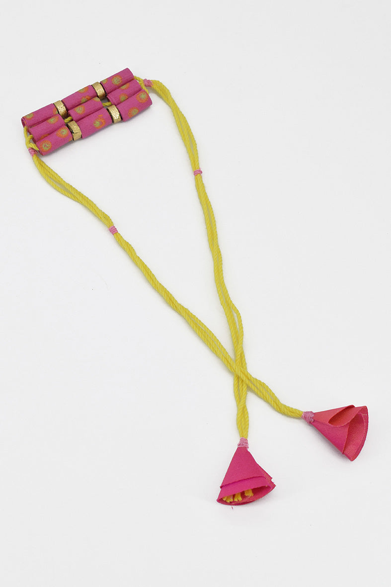 Trimmed paper bead rakhi with tassel