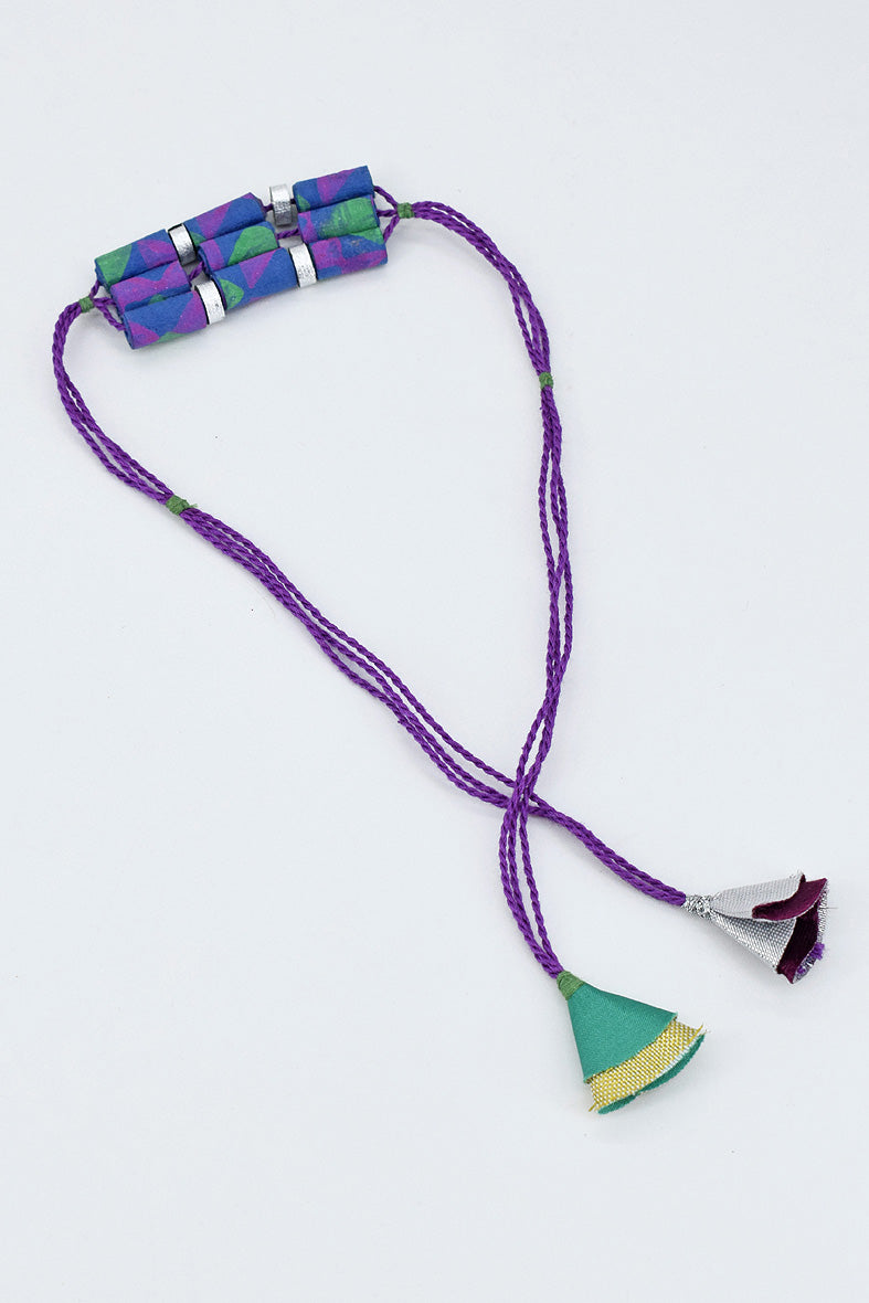Trimmed paper bead rakhi with tassel
