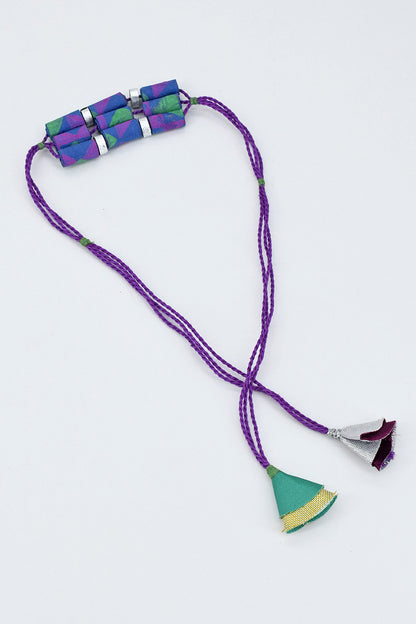 Trimmed paper bead rakhi with tassel
