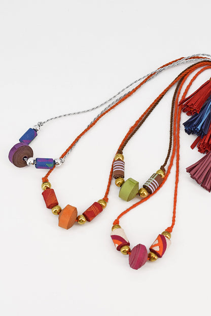 Trimmed paper bead rakhi with tassel