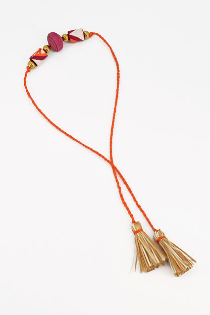 Trimmed paper bead rakhi with tassel