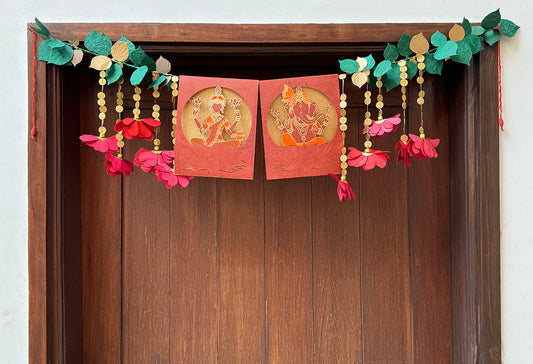 Laxmi Ganesh Vandanwar with flower strings & gold coins