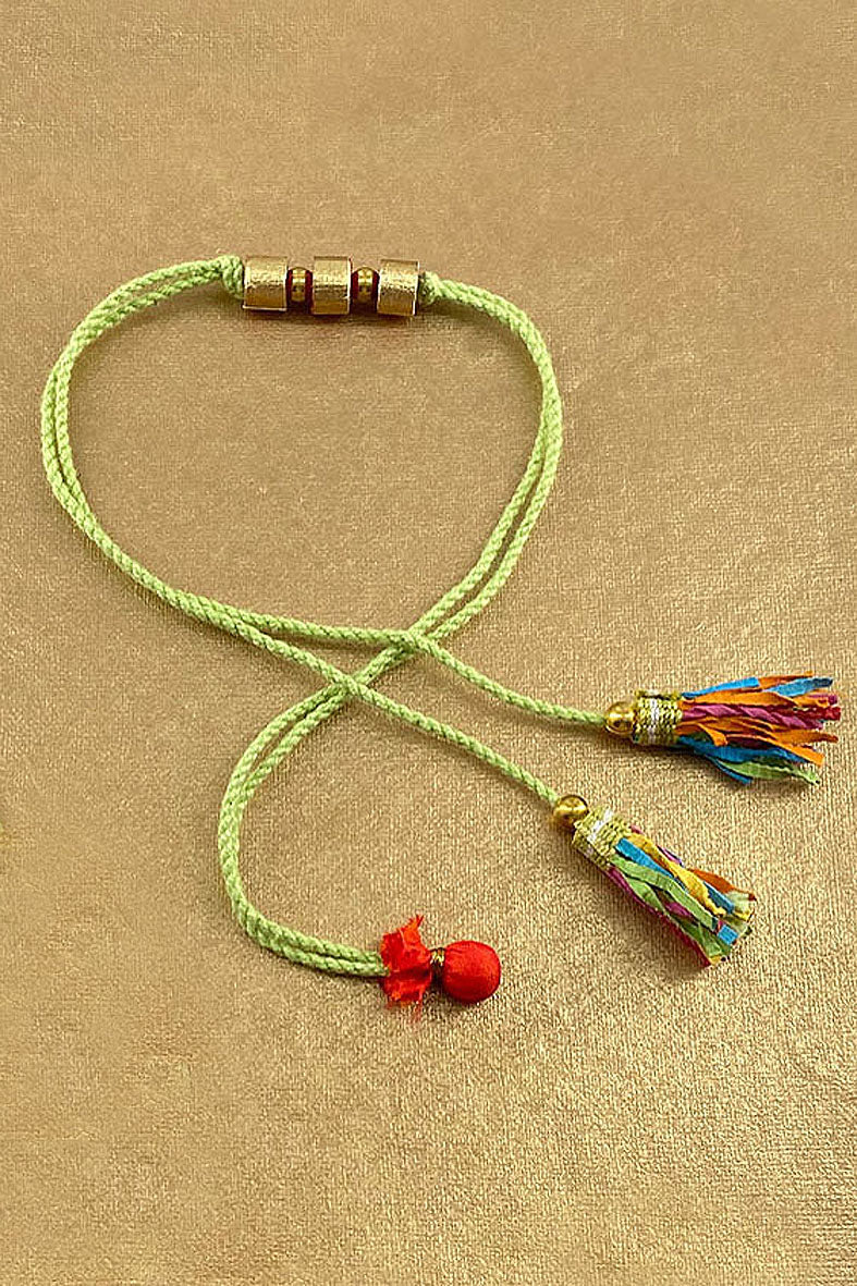 Paper Ribbon and Potli Handmade Paper Rakhi Online