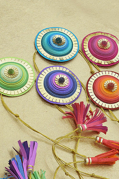 Quill & Kavach With Tasseled Ends Paper Rakhi Online