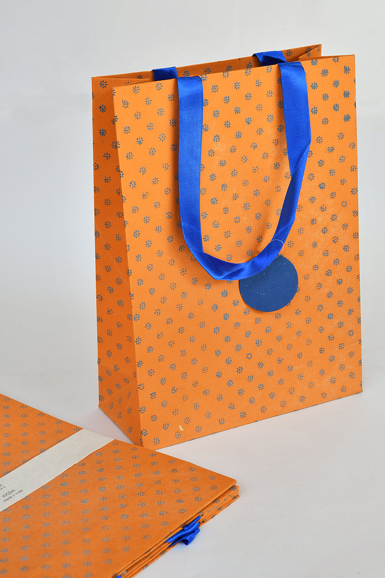 Blue Dots Grid On Orange Handmade Paper Gift Bags Online
